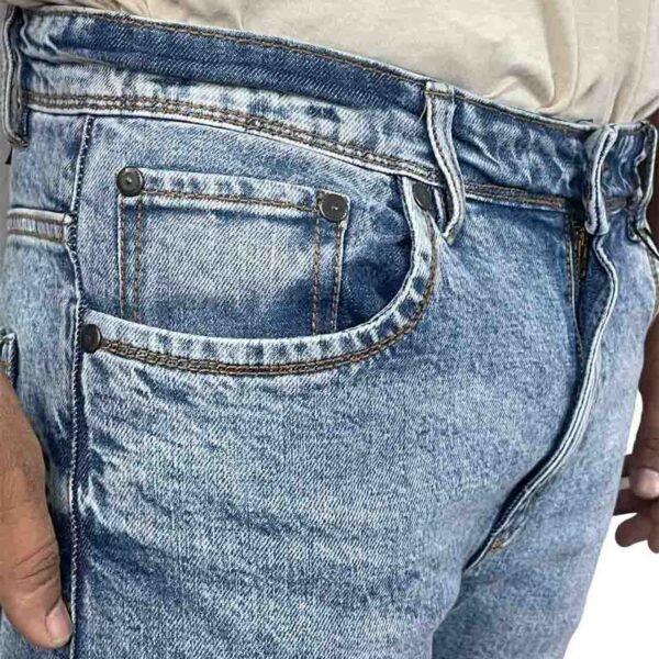 Close-up of the coin pocket on Vintage Mid Blue Jeans, showcasing classic denim craftsmanship