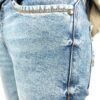 Mid Indigo Slim Fit Jeans with close-up of subtle tagging effect on side seam