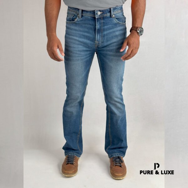 Men’s jeans bootcut with a classic fit, styled with a relaxed cut and slight flare at the hem.