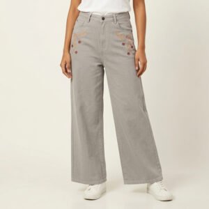 Modern street-style look featuring high-waisted Floral Baggy Jeans with white sneakers.